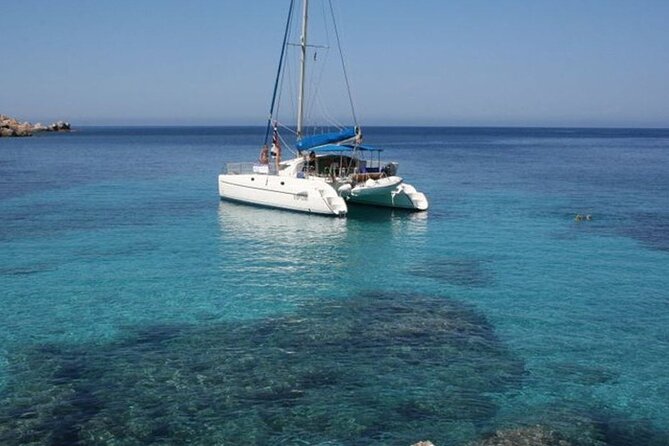 2-Catamaran tour from Cannigione to the Maddalena Archipelago - Budelli’s Pink Beach: an iconic photo stop with strict limits