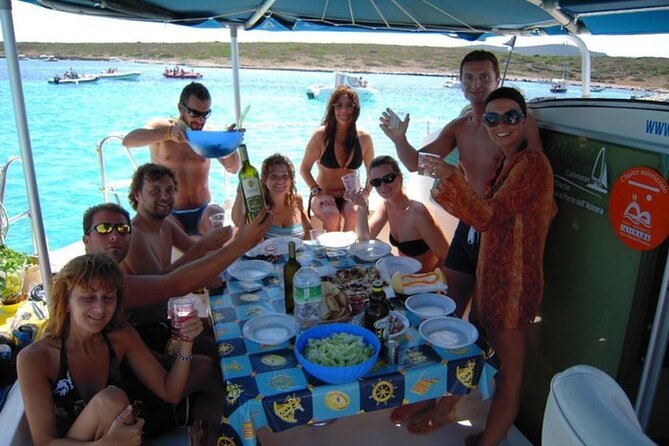 2-Catamaran tour from Cannigione to the Maddalena Archipelago - Razzoli and Santa Maria: cliffs, coves, and park rules