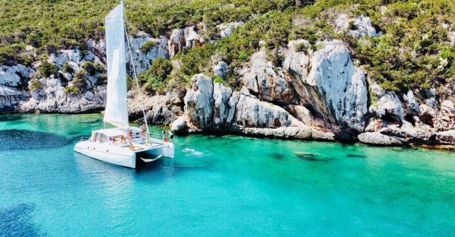 Alghero: Full day on a catamaran in Porto Conte Natural Park - A real-world touch: Tony’s guide style