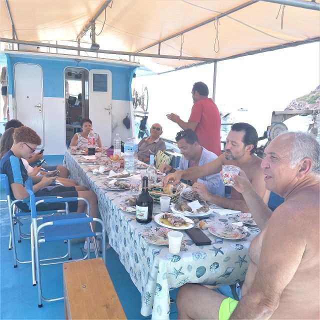 Alghero: Gulf of Alghero Fishing Boat Trip with Fresh Lunch - Meeting the crew at the Lo Frasso dock in Alghero