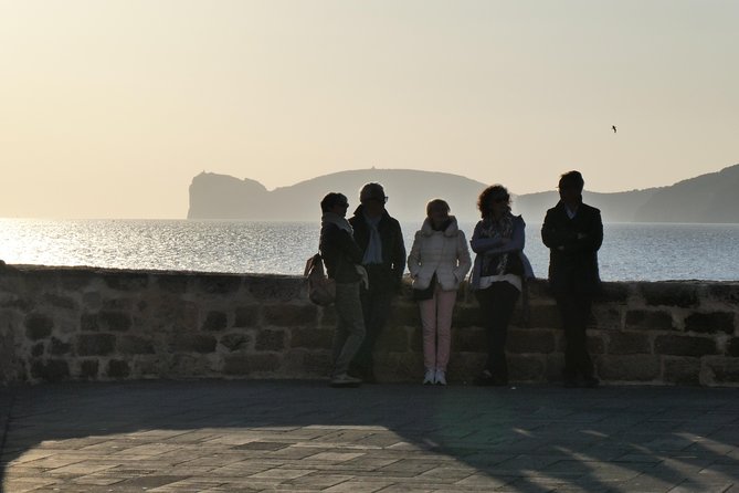 Alghero: walking tour with bilingual local guide - Piazza Civica: The Medieval Square and Charles V’s Overnight Stop