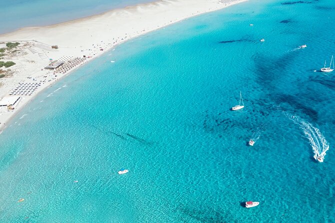 Beach Tour Porto Giunco and Cala Sinzias from Cagliari - Spiaggia di Porto Giunco: swim, snorkel, and a beach made for an easy first stop