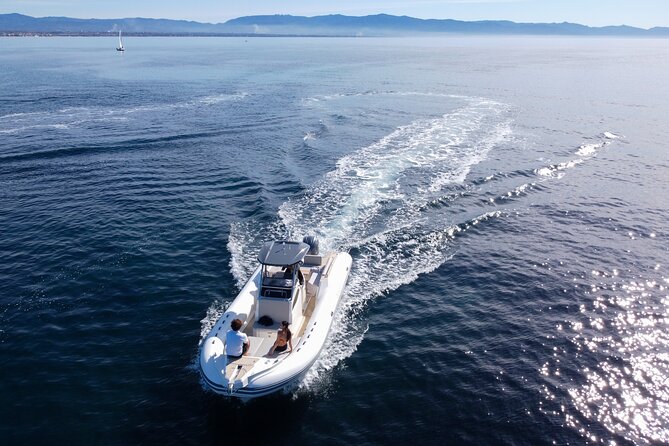 Boat excursion in Cagliari: 3 amazing hours! - City views from the water: Bonaria, the stadium, and Sant’Elia