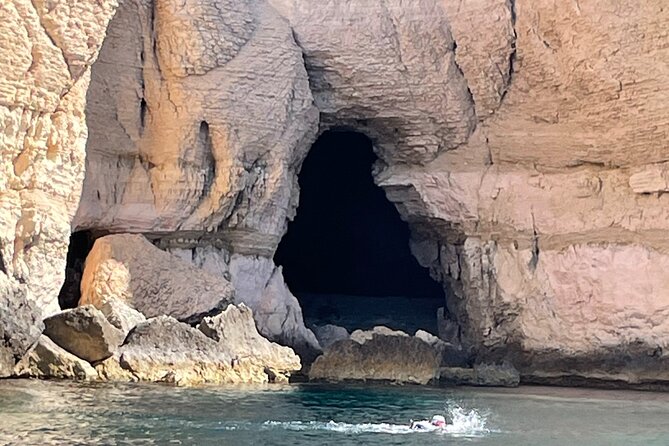 Boat excursion to the gulf of Cagliari and its coves - Stop 1: Calamosca Beach and the Spanish tower views