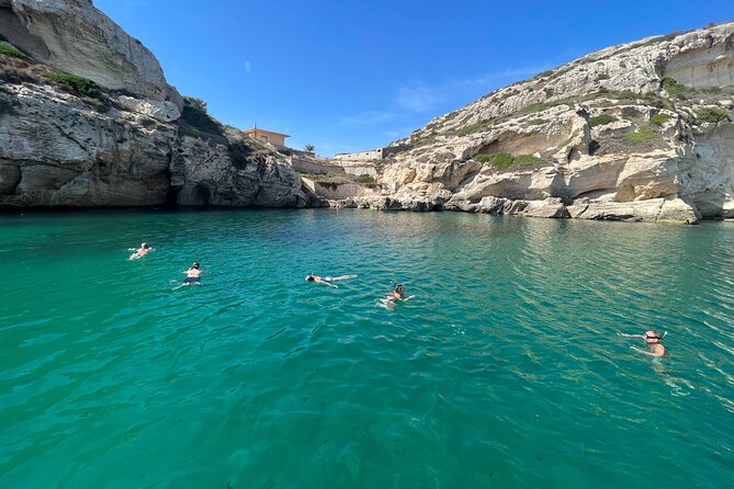 Boat Tour at Devil's Saddle: 4 Swim Stops, Snorkeling & Prosecco - Stop 2: Calamosca beach time for quick snorkeling