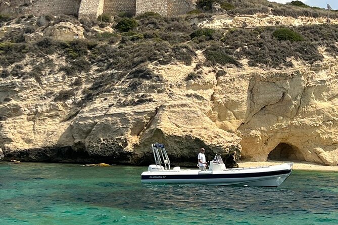 Boat tour the devil's saddle,snorkeling,prosecco and lots of sun - Poetto: seeing the long city beach from the marina