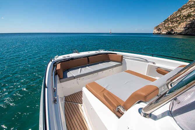 Cagliari 3 Hours Luxury Motorboat Tour - Wine and Snorkeling - On-Board Comfort: Bathroom, Changing Area, and Space to Breathe