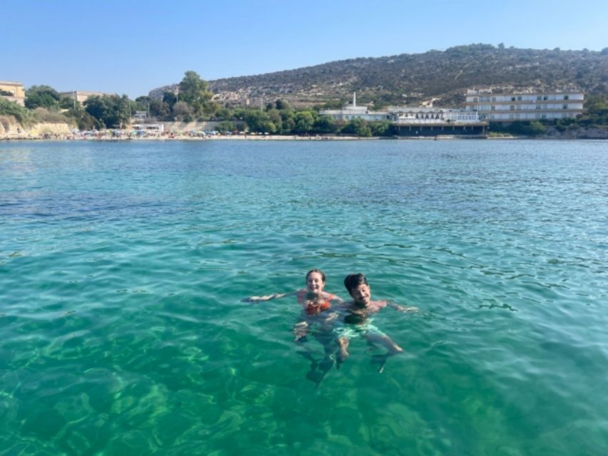 Cagliari: Boat Tour snorkeling Sella con con aperitivo - Key highlights worth planning around