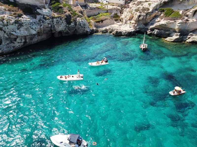 Cagliari: Boat Tour with 4 Swim Stops, Snorkeling & Prosecco - Prosecco, music, and the skipper’s stories
