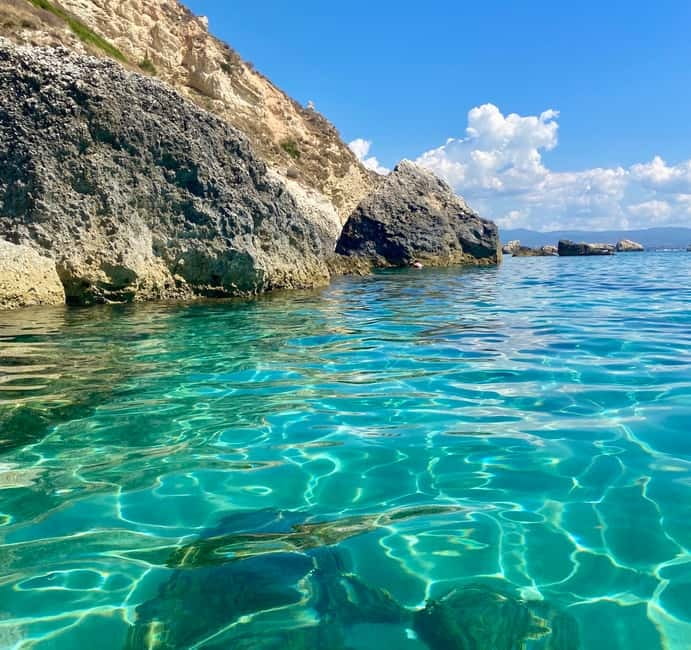 Cagliari: Boat Tour with Snorkeling, GoPro & Sardinian Beer - Stop by stop: Cala Mosca, Sella del diavolo, Poetto, and the marine-life swim