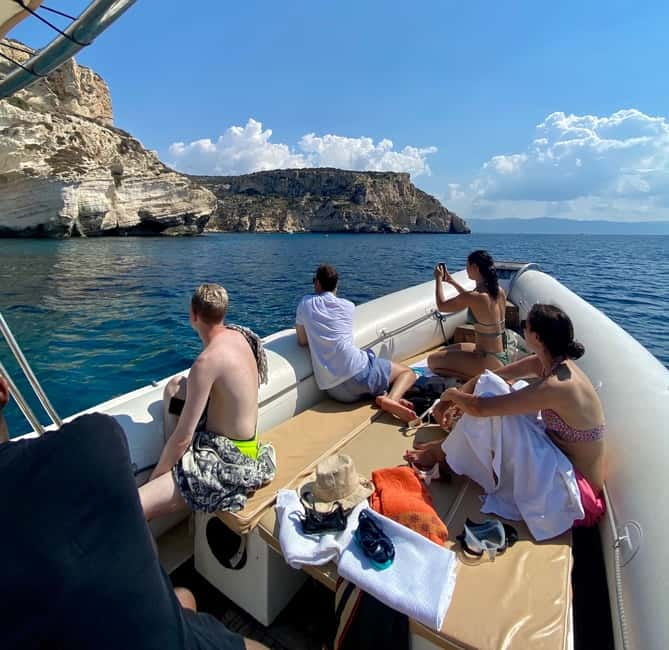 Cagliari: Boat Tour with Snorkeling, GoPro & Sardinian Beer - Where you meet and how the tour runs from Cagliari Port