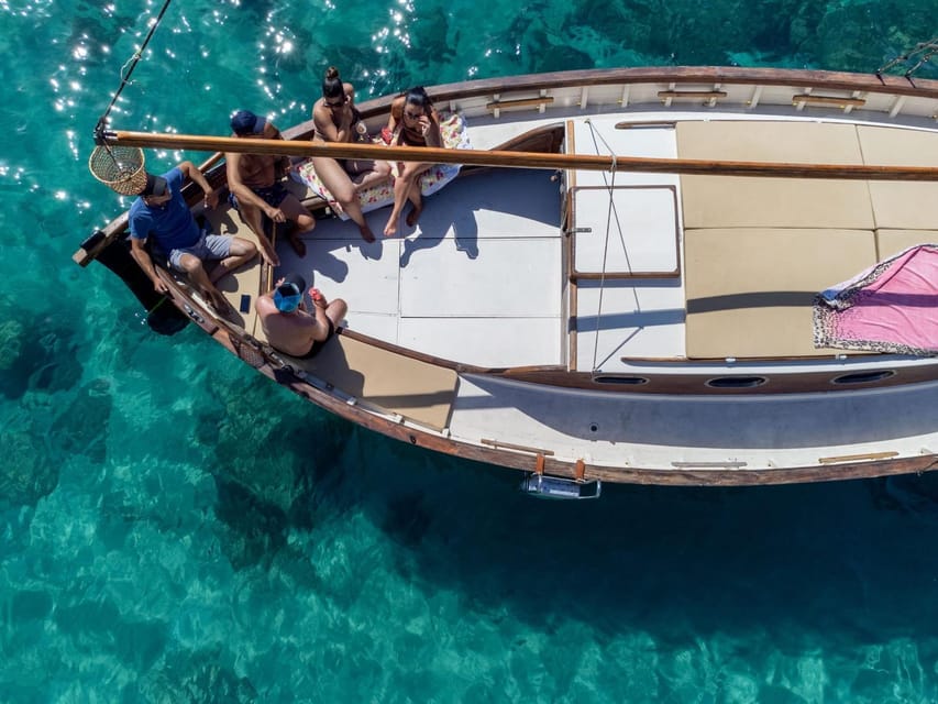 Cagliari: Classic Boat tour along the gulf with tasting. - Guides and Crew: Andrea, Massimo, Marco, and Davide