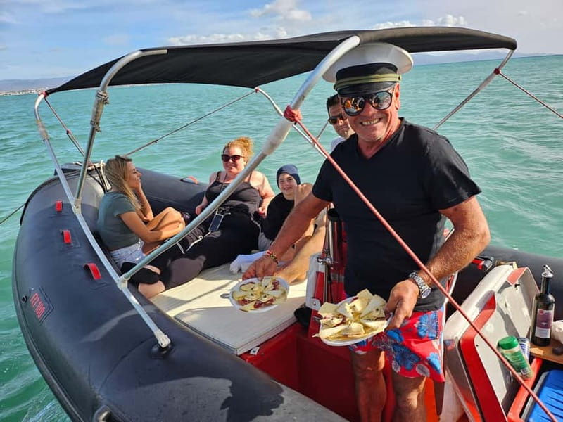 Cagliari:devil's saddle big cruise by boat drink & snack - Cala Bernat: your first real break with photos and water time