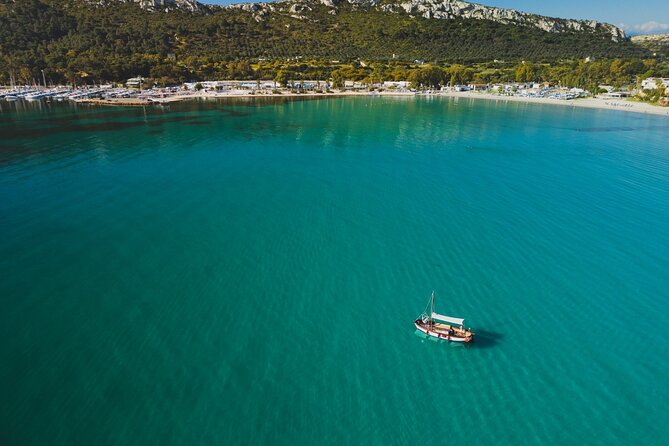 Cagliari : Gozzo Tour with 3 Swim Stops, Snorkeling & Local Food - Price and value: what $57.95 includes (and what to budget for)