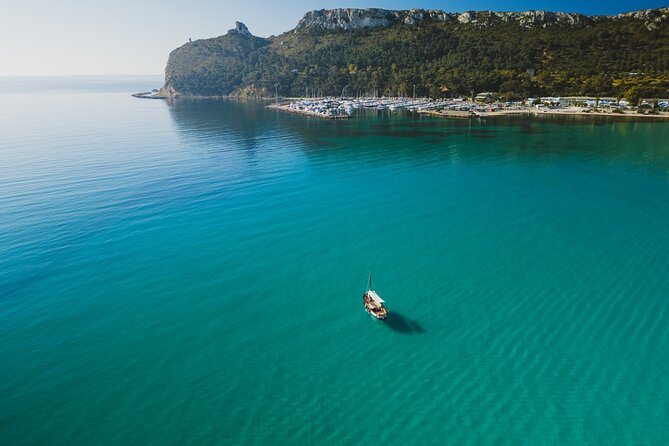 Cagliari : Gozzo Tour with 3 Swim Stops, Snorkeling & Local Food - Stop-by-stop: Cala Bernat, Capo Sant’Elia, Calamosca, and more