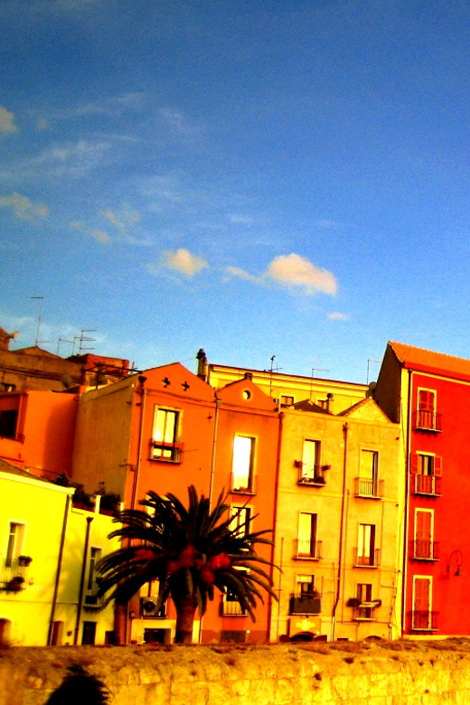 Cagliari Half-Day Private Sightseeing Tour - Entering the medieval quarter through the National Archaeological Museum area