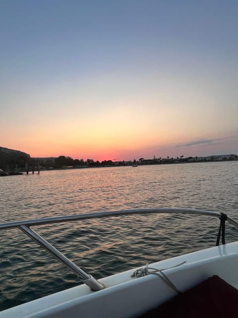 Cagliari: sunset aperiboat in the Angel's Gulf - Entering The Boat Scene: Cagliari’s Two Meeting Points
