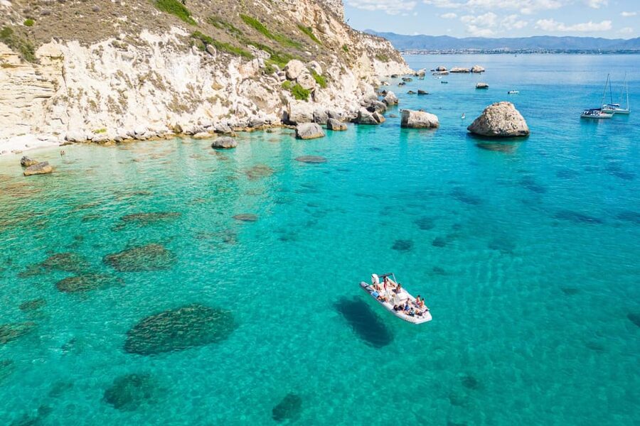 Cagliari: Zodiac Boat Tour, 3-4 SwimStops, Wine & Snorkeling - Homemade wine on the water: small, not silly