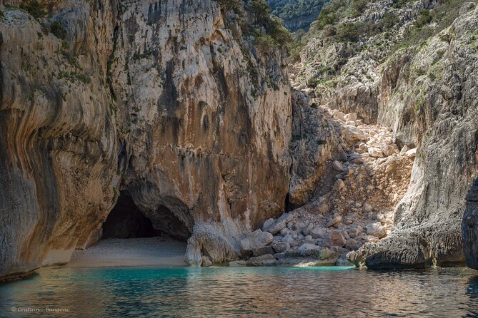Cala Mariolu tour with Swim Stops - Cala Sisine: fine white sand, six caves, and a coast that feels cinematic