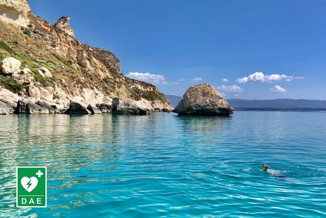 Catamaran tour stops bathing and snorkeling toast with prosecco - Leaving Cagliari behind: Golfo degli Angeli and what the skipper actually does