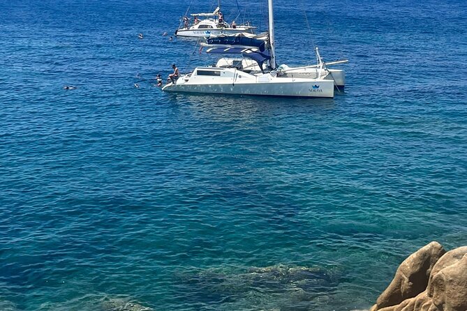 Daily cruise on a sailing catamaran on the La Maddalena archipelago - What the crew actually does for your comfort (from guide styles and on-boat pace)