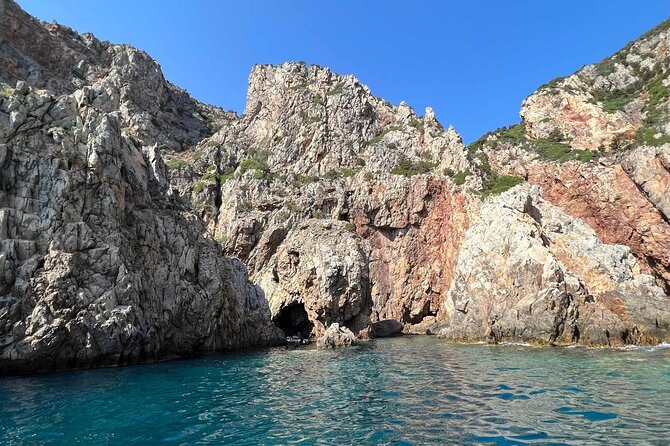 Dinghy tour to Buggerru in Southern Sardinia - Pan di Zucchero via the Masua inlet: the sea stack symbol of Iglesias