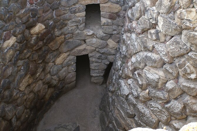 Excursion to the Nuraghe Su Nuraxi of Barumini from Cagliari - Villamar in Piazza del Arte: murals, a drink, and a bathroom break