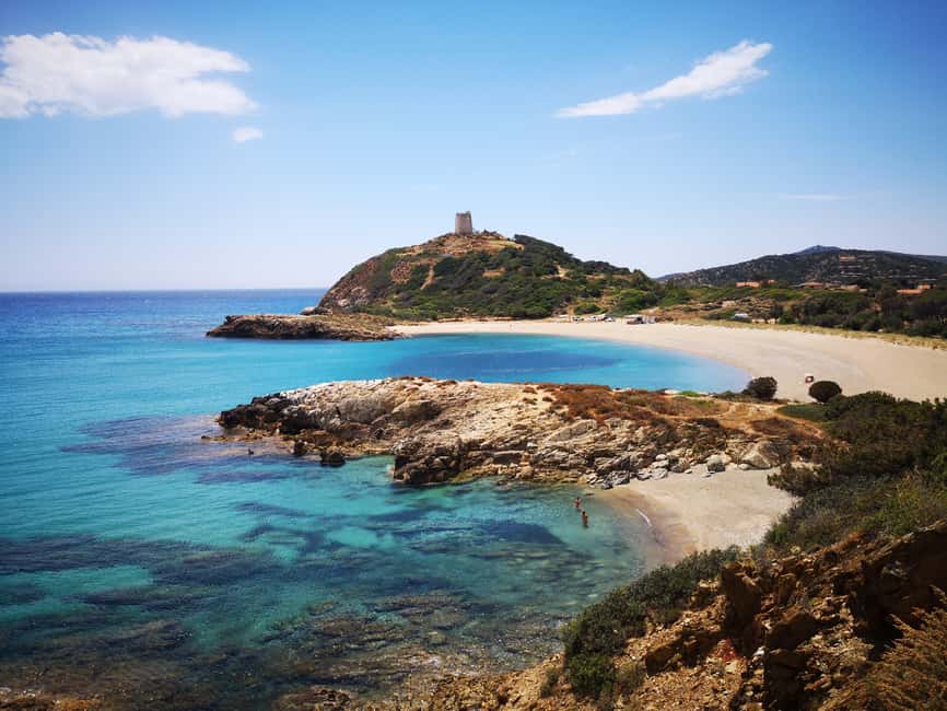 From Cagliari: Chia Beaches Tour with van - Santa Gilla lagoon: pink flamingos on the way