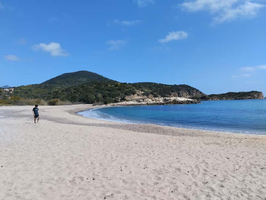 From Cagliari: Chia Beaches Tour with van - Su Giudeu beach: pink granite, shallow water, and island views