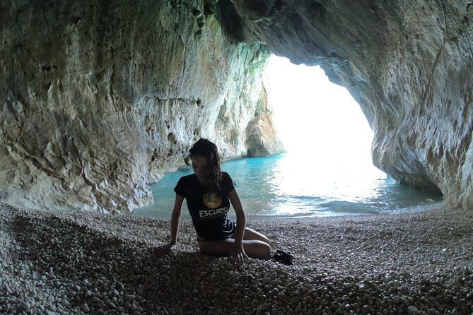 From Cala Gonone: Dinghy trip in the Gulf of Orosei - Stop 1: Cala Luna for half-moon sand, caves, and lagoon colors