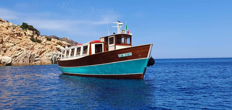 From La Maddalena or Palau: Archipelago Boat Tour - Getting Around by Vintage Gozzo: What the Città di Chiavari Feels Like