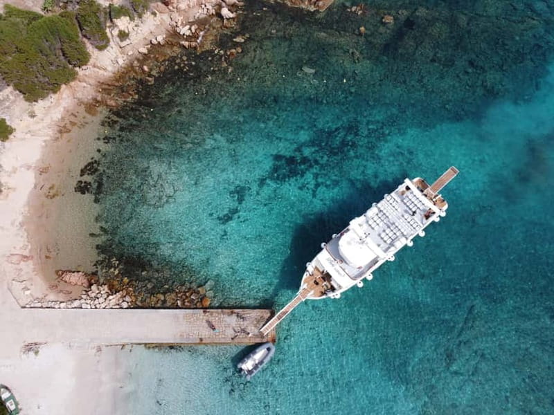 From Palau: 4 stops boat tour to La Maddalena archipelago - Price and what it really covers (and what costs extra)