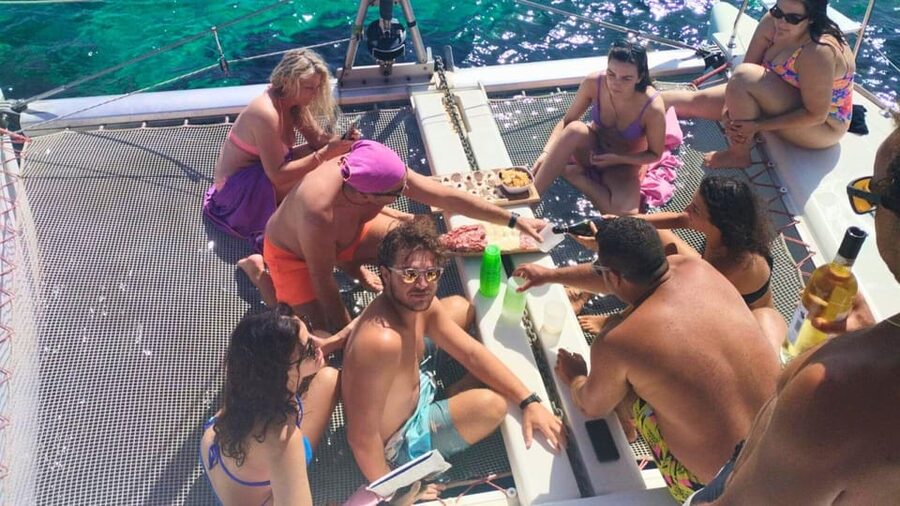 From Palau: Catamaran tour in La Maddalena Archipelago - The Best Part for Many People: Lunch on Board Like a Sardinian Feast