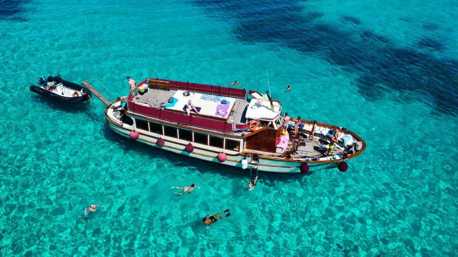 From Palau/La Maddal: Boat Tour of La Maddalena Archipelago - Caprera and Budelli: Cala Serena swim, then the pink-sand scenery from the boat