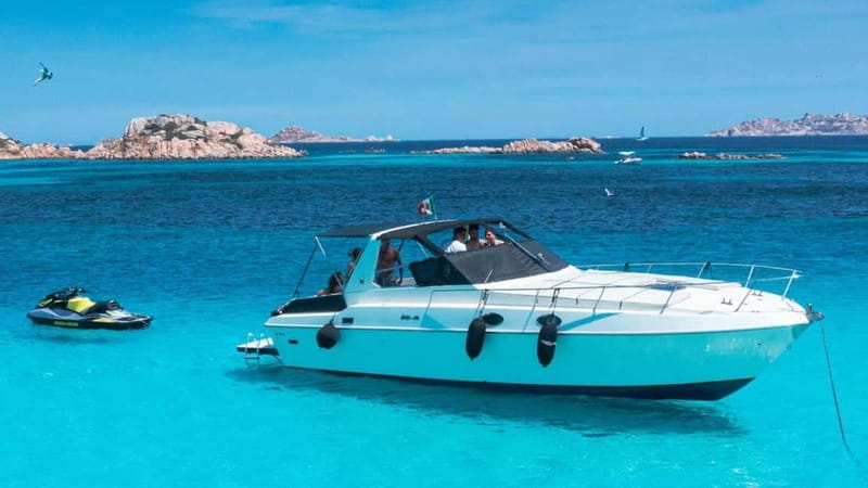 From Palau: Speedboat tour in La Maddalena Archipelago - Budelli natural pools and the Pink Beach view from afar