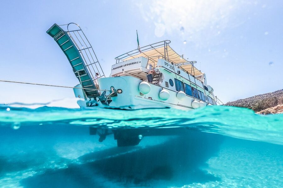 From Sardinia: La Maddalena Archipelago Full-Day Boat Tour - La Maddalena town hour: shopping, Vermentino, and wandering