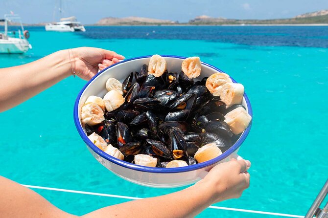 From Stintino: sailboat tour to Asinara with lunch - On-Board Comfort: Restroom, Snorkeling Gear, and Real Lunch