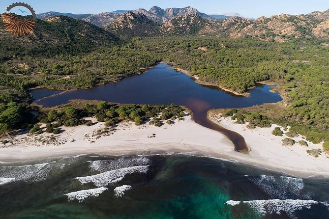 From the hills to Oasi Biderosa & Capo Comino with Electric Mountain Bikes - Stop 2: Spiaggia di Bérchida and Flamingo Lagoon Time