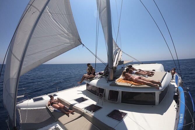 Full day catamaran tour in Alghero - Back to Alghero: Final Swim and a 5:30pm Return