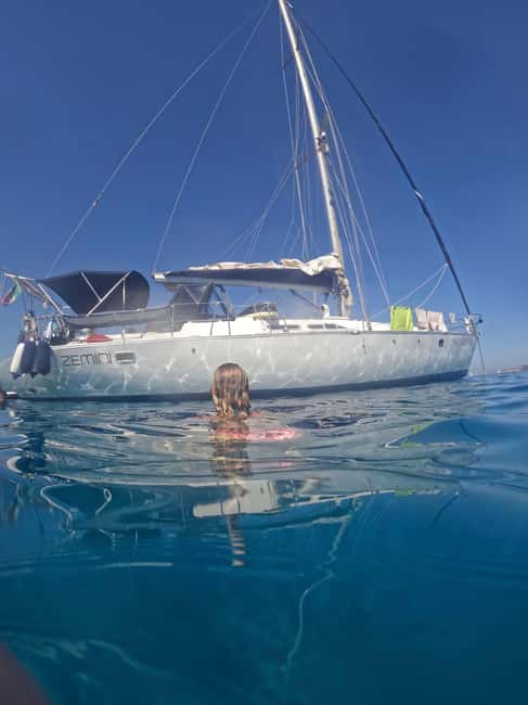 Half Day tour Alghero - 15 m Sailing boat - Capo Galera anchorage: swims, snorkeling, and SUP time