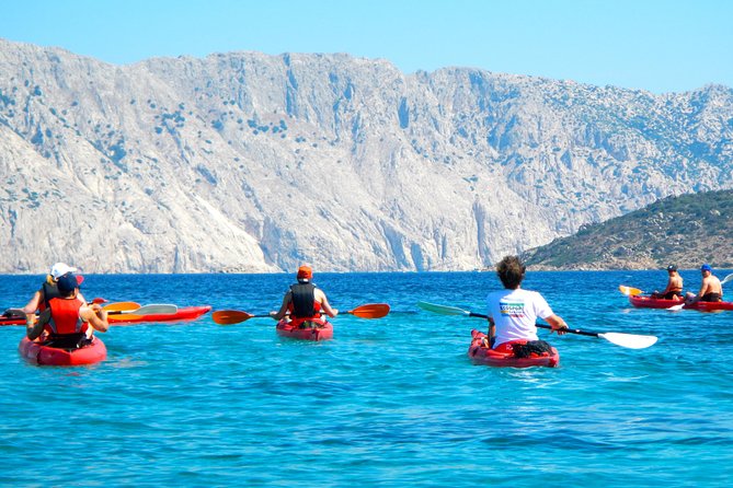 Kayak Tour with Snorkeling and Local Aperitif - Stop 1: Tavolara–Punta Coda Cavallo protected waters and the marine cave approach
