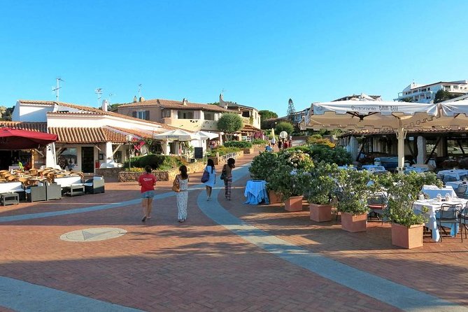 Olbia : Costa Smeralda and Porto Cervo Tour + pickup included - Baja Sardinia for an Hour: Beach Time With a Big-Resort Backdrop