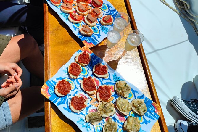 One day excursion on a sailing boat in the Gulf of Alghero - Cala Dragunara lunch: why the included meal is part of the value