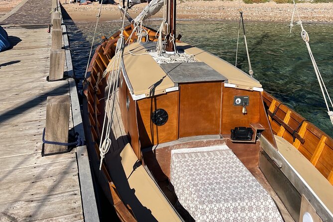 One-day tour on a vintage cruise in Tavolara and Molara - Spiaggia del Dottore: Short Visit, Big Color Payoff