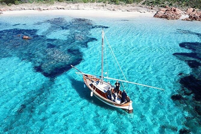 One-day tour on a vintage cruise in Tavolara and Molara - Punta Don Diego: Wine and Cured Meats by the Water