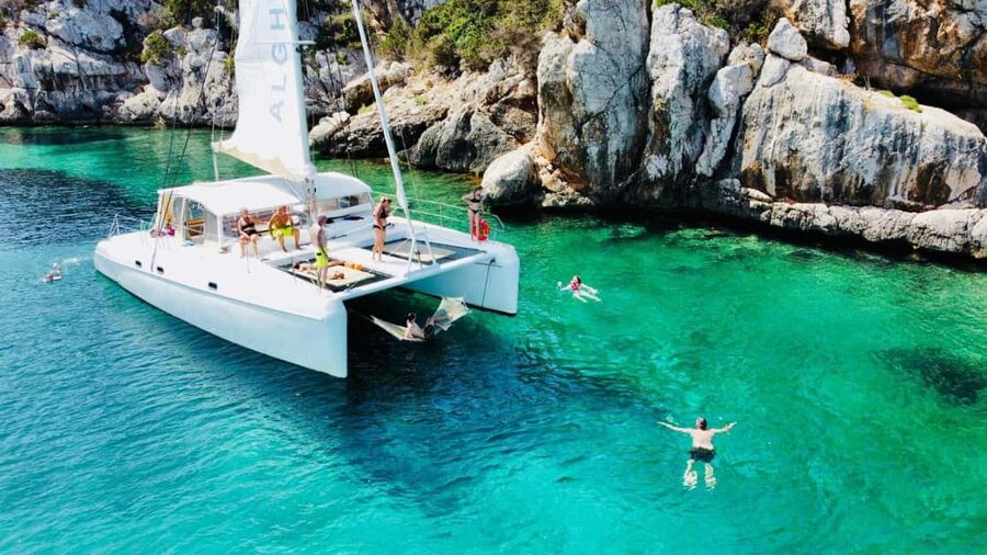 Porto Conte: Half-day catamaran tour with aperitif - Porto Conte Catamaran: What makes this half-day so worth it