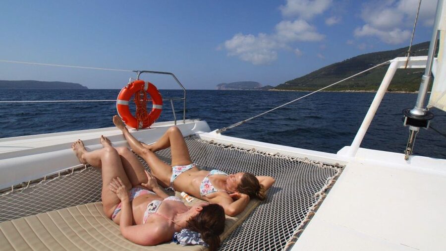 Porto Conte: Half-day catamaran tour with aperitif - What the catamaran itself is like (and why you’ll care)