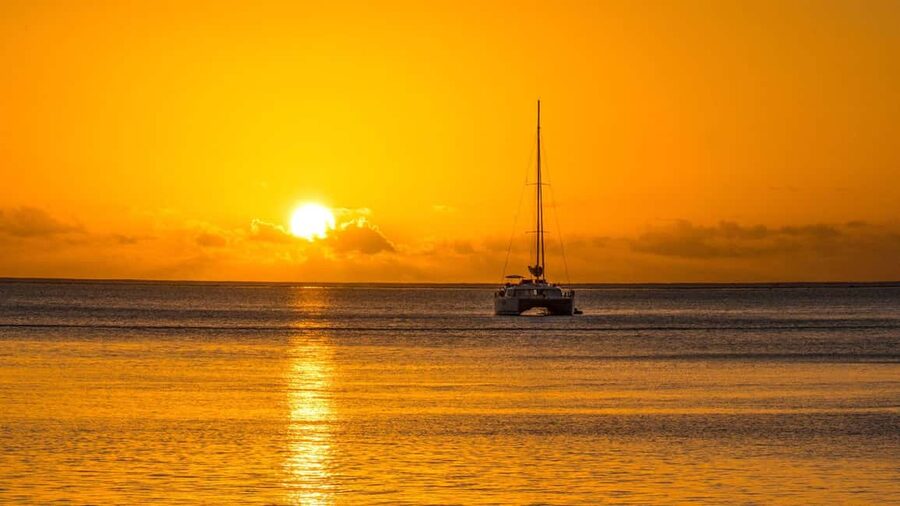 Porto Conte: Sunset catamaran excursion with aperitif - From Marina di Porto Conte to Capo Caccia stacks