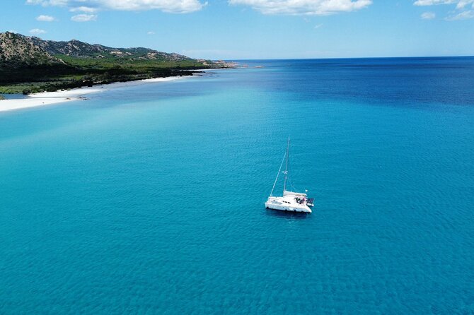 Private catamaran sailing trip around La Caletta -Berchida - Sardinia - Stop 3: Spiaggia di Capo Comino—when the itinerary turns into a photo stop