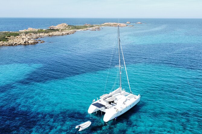 Private catamaran sailing trip around La Caletta -Berchida - Sardinia - Stop 4: Spiaggia di Berchida—closing the loop on the route name